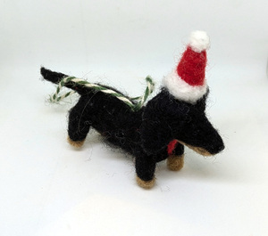 Personalised Needle Felted Sausage Dog Wearing Christmas Hat on a Wood Slice